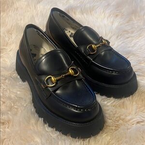 Black Loafers with Gold Hardware